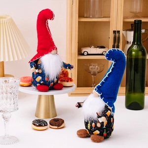 Detailed view of handmade plush Independence Day gnomes holding miniature wine bottles