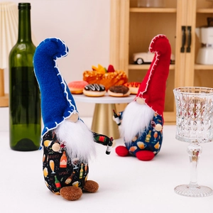 Detail of red and blue Independence Day gnomes with beer patterns in festive dining scene