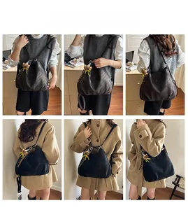 Detailed views of a large pleated tote bag in black and brown with a cute bear charm