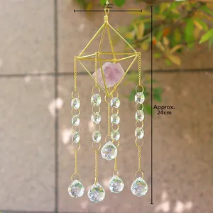 Detail of crystal suncatcher with amethyst stone, golden frame and dimension markings