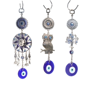Three evil eye suncatchers with tree of life, owl and sun moon designs for home decor