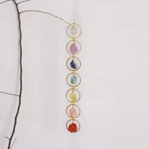 Handmade 7 Chakra Tree of Life hanging ornament with natural crystals on golden metal rings