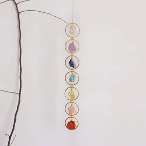Seven chakra raw stone hanging ornament with golden rings and handcrafted wire wrap detail