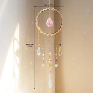 Detail showing crystal suncatcher dimensions: 10cm ring diameter and 31cm total length