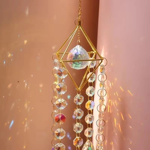 Golden rhombic crystal suncatcher with K9 multi-faceted ball reflecting rainbow light