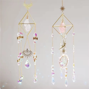 Golden suncatcher set with raw colorful crystals and butterfly charms for home decor