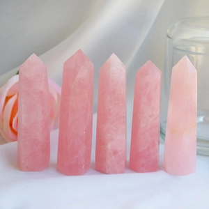 Set of five natural rose quartz hexagonal crystal points with ice crack textures