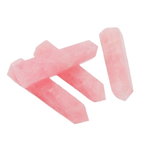 Set of four natural pink rose quartz hexagonal crystal points with ice crack textures