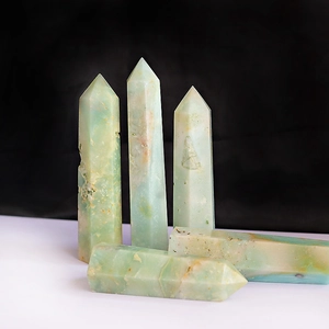 Macro detail of natural amazonite crystal pillars showing unique green texture and facets