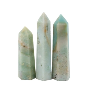 Amazonite crystal hexagonal prisms set of three natural gemstone towers on white background
