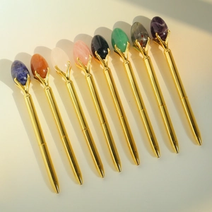 Set of 8 gold plating ballpoint pens featuring colorful oval gemstone toppers