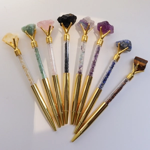 Golden crystal ballpoint pens set featuring eight different natural raw stone minerals