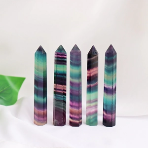 Set of five natural rainbow fluorite hexagonal crystal pillars for modern home decor