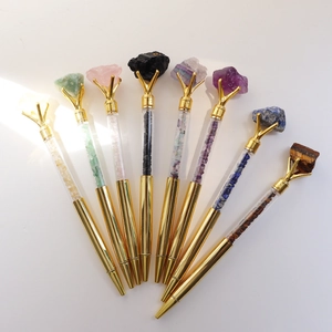 Set of 8 gold crystal pens with natural raw gemstones and colorful crushed stone filling