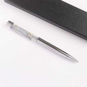 Close-up of silver crystal gravel ballpoint pen with elegant black gift box set
