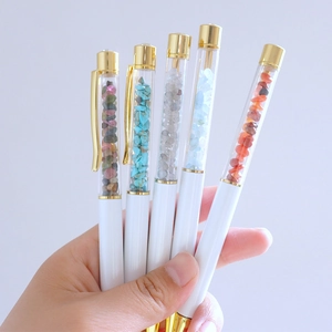 Penne a sfera in metallo con cristalli in cinque colori con clip oro e fusto bianco
