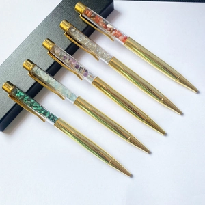 Set of five elegant gold crystal ballpoint pens with colorful gemstone chip fillings