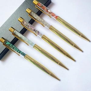 Set of five gold crystal gravel ballpoint pens with colorful stones in a black gift box