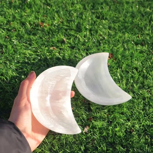 Modern minimalist white selenite crescent moon bowl set with natural fiber texture