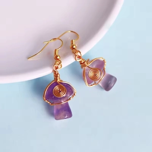 Handmade purple crystal mushroom earrings with gold wire wrap and elegant spiral design