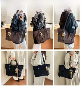 Detailed views of vintage large tote bag in black and brown with cute bear charm