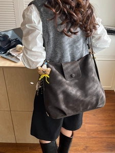 Large capacity dark brown tote bag with matte leather finish and cute bear charm pendant