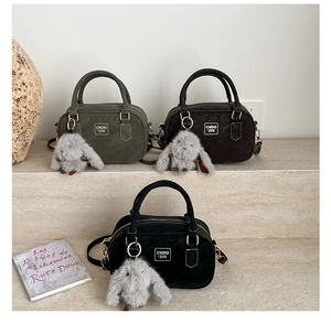 Retro bowling bags in green, coffee, and black with cute plush rabbit pendants