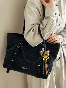 Retro black large capacity tote bag in matte leather with decorative straps and bear charm