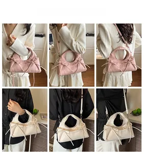 Detailed views of crescent moon bag with bows in pink and beige, showing various carrying styles