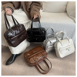Detailed group view of retro square handbags in five colors with bow and heart charms