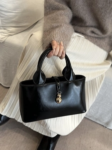 Vintage black oil leather tote bag with gold gourd charm for women's autumn fashion