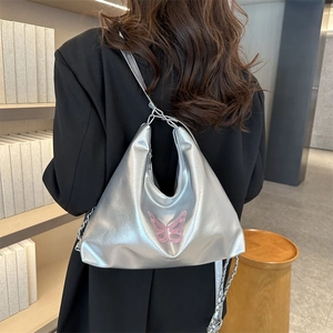 Silver metallic hobo shoulder bag with pink butterfly embroidery and chain strap