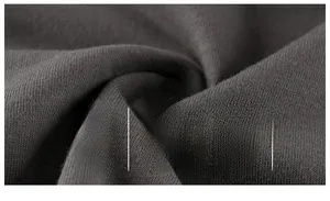 Vista macro della trama in maglia grigio scuro traspirante per abbigliamento per bambini