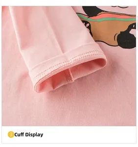 Close-up of elastic pink cuffs and cute panda print on soft cotton long sleeve tee