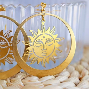 Bohemian gold sun goddess hoop earrings with intricate vintage celestial design hooks