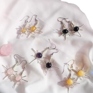 Five pairs of handmade solar wire-wrapped silver earrings with colorful crystal stones