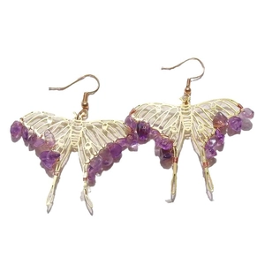 Handmade gold butterfly earrings with purple amethyst crystals and bohemian hollow design
