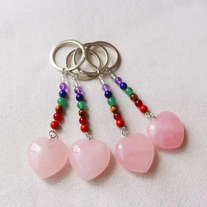 Set of four natural pink quartz heart keychains with colorful beads and silver metal rings
