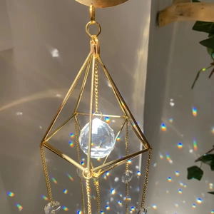 Geometric metal crystal suncatcher wind chime with rainbow light refraction effect