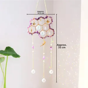 Cloud-shaped suncatcher with purple amethyst, honeycomb metal frame and crystal ball charms