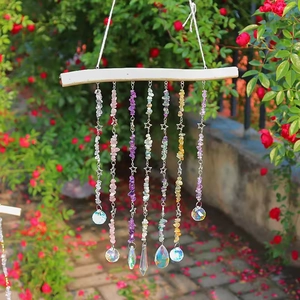 Handmade wooden sun catcher with colorful crystals and star charms for garden decor