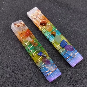 Detail view of 7 chakra healing crystal wand with selenite and wire wrapped stones