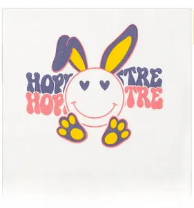 Close-up of white knitted t-shirt featuring colorful pop art bunny smile graphic