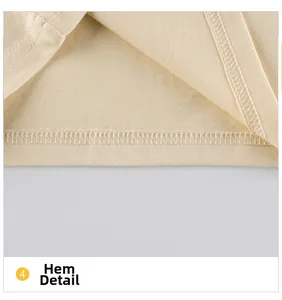 Macro de la double couture et texture du bas d'un t-shirt en coton beige pour enfant