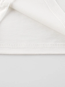 White cotton long sleeve T-shirt featuring high-quality hem stitching and flat lock seams