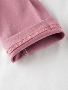 T-shirt in maglia rosa a maniche lunghe per bambina con dettagli di cuciture di qualità