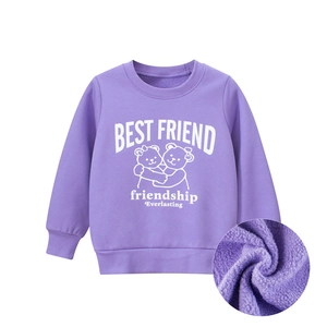 Detail view of purple girls' sweatshirt showing soft warm fleece lining texture