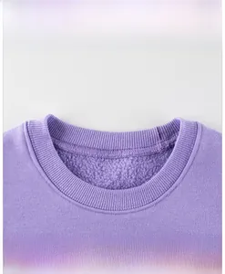 Close-up of purple sweatshirt collar with ribbed texture and soft fleece lining