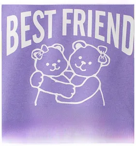 Close-up of purple sweatshirt fabric with white Best Friend teddy bear print detail