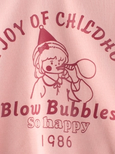 Pink girl sweatshirt with cartoon girl blowing bubbles and childhood slogan print